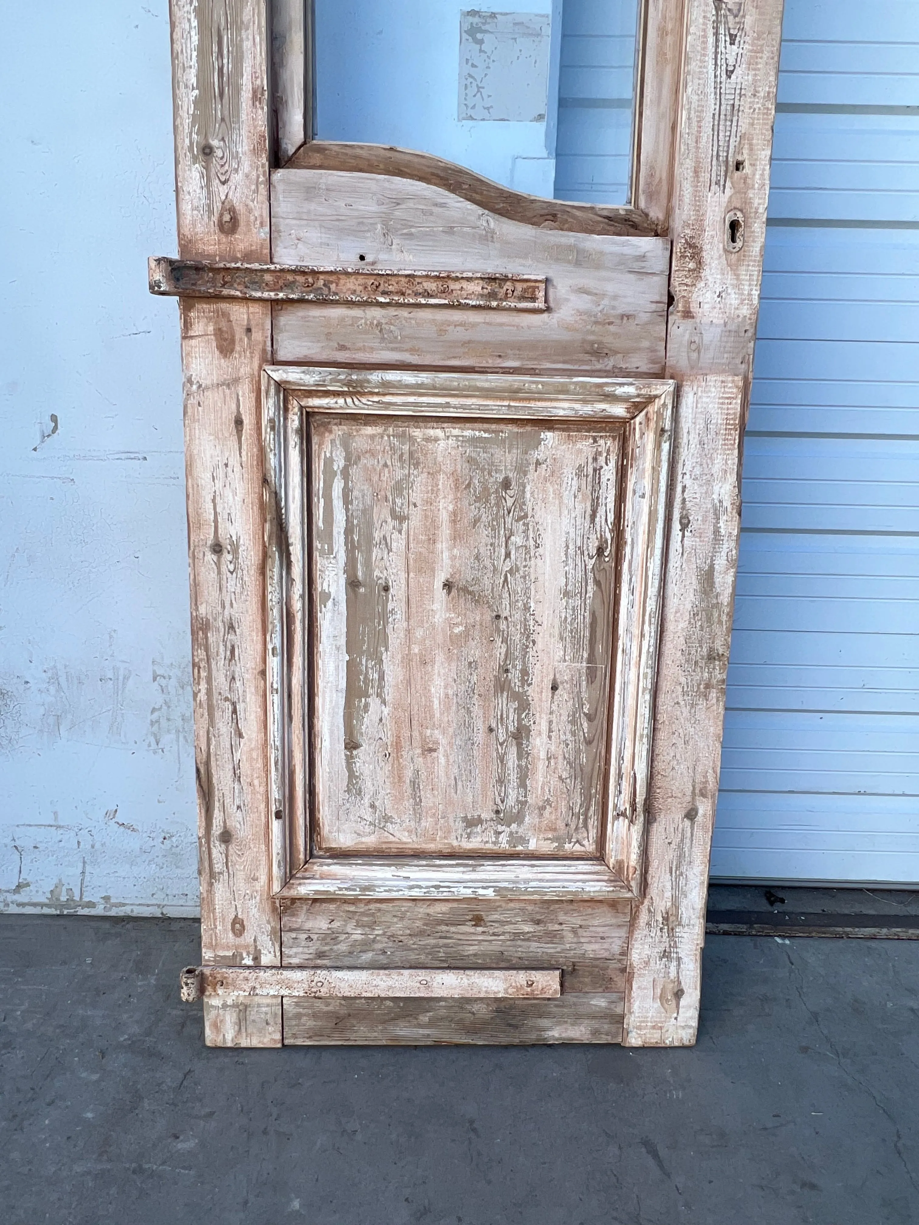 Pair of Washed Antique Wood Arched Single Lite Carved Doors with Raised Panels